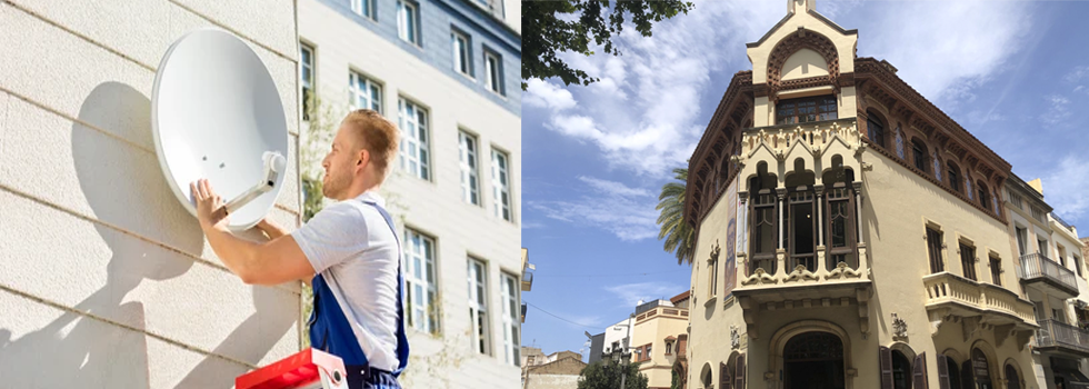 Un trabajador instala una antena parabólica en un edificio; junto a él se ve un edificio histórico con una arquitectura ornamentada y una palmera.
